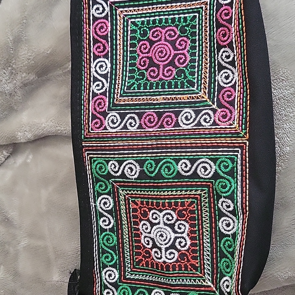 Stitched zippered clutch
